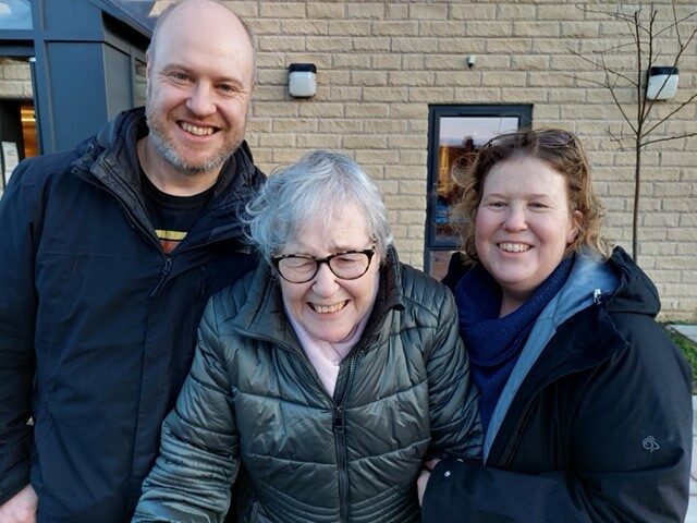 Katy Butterill with her brother and mum, who has PSP
