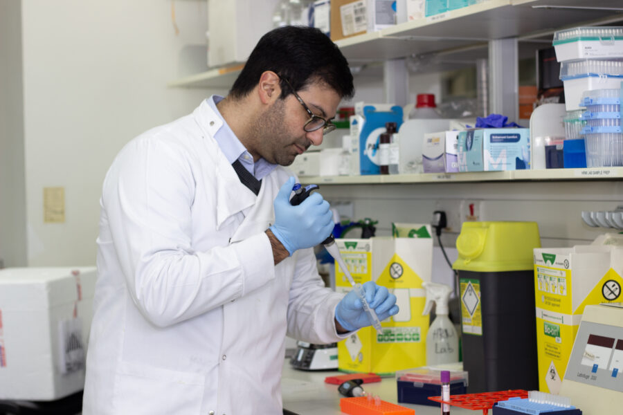 Dr Ed Jabbari working in a research lab.